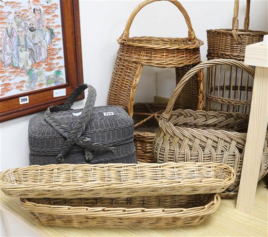 Two baguette baskets, a French fishermans baskets, two container stands etc